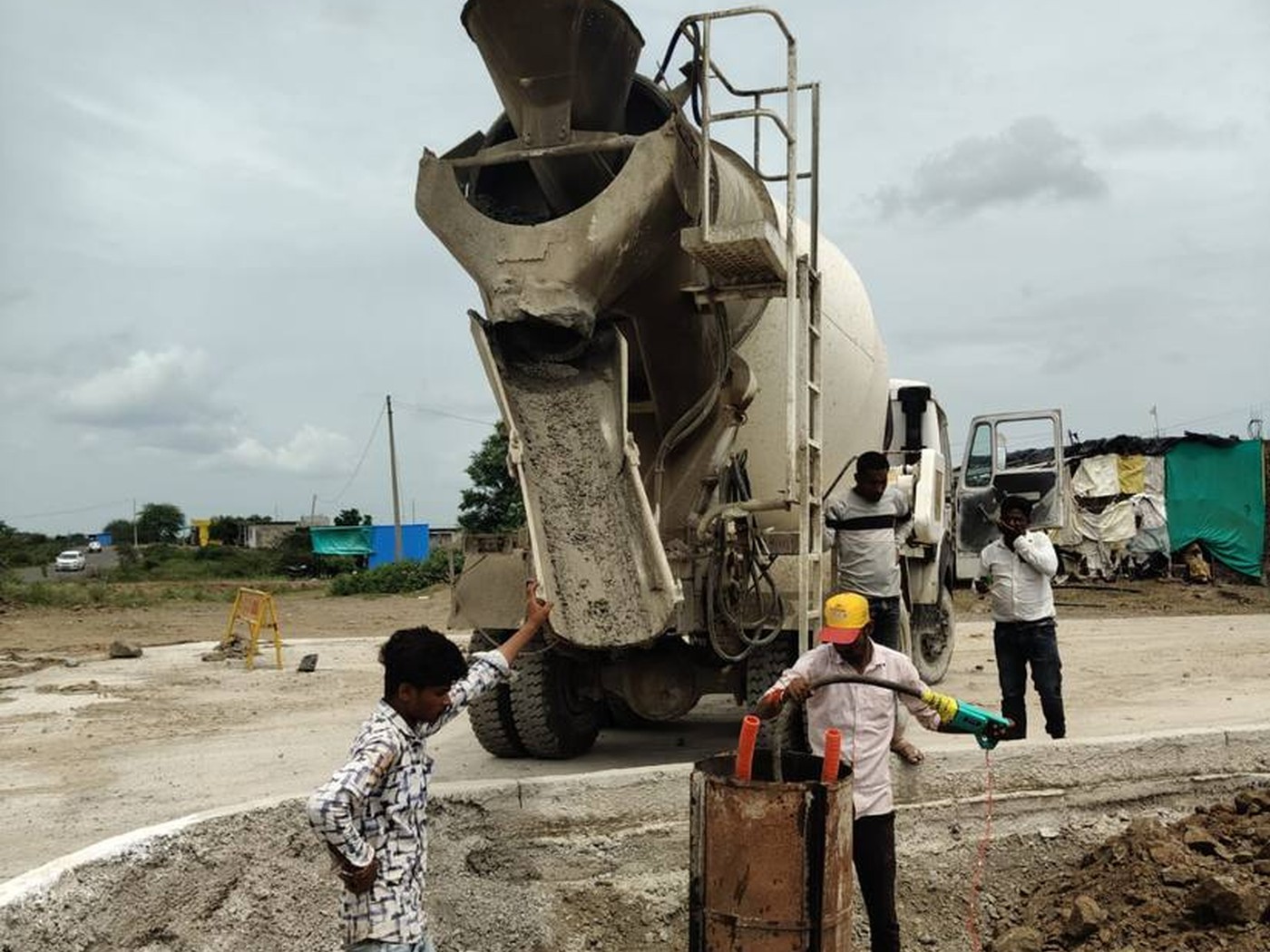 Concrete being placed around a foundation pile