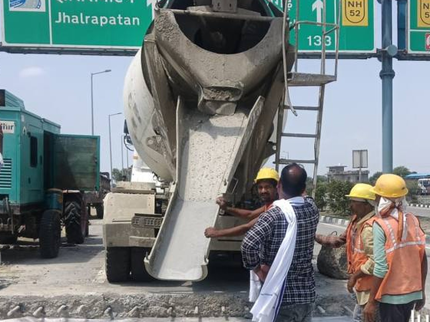 Concrete being poured during road work