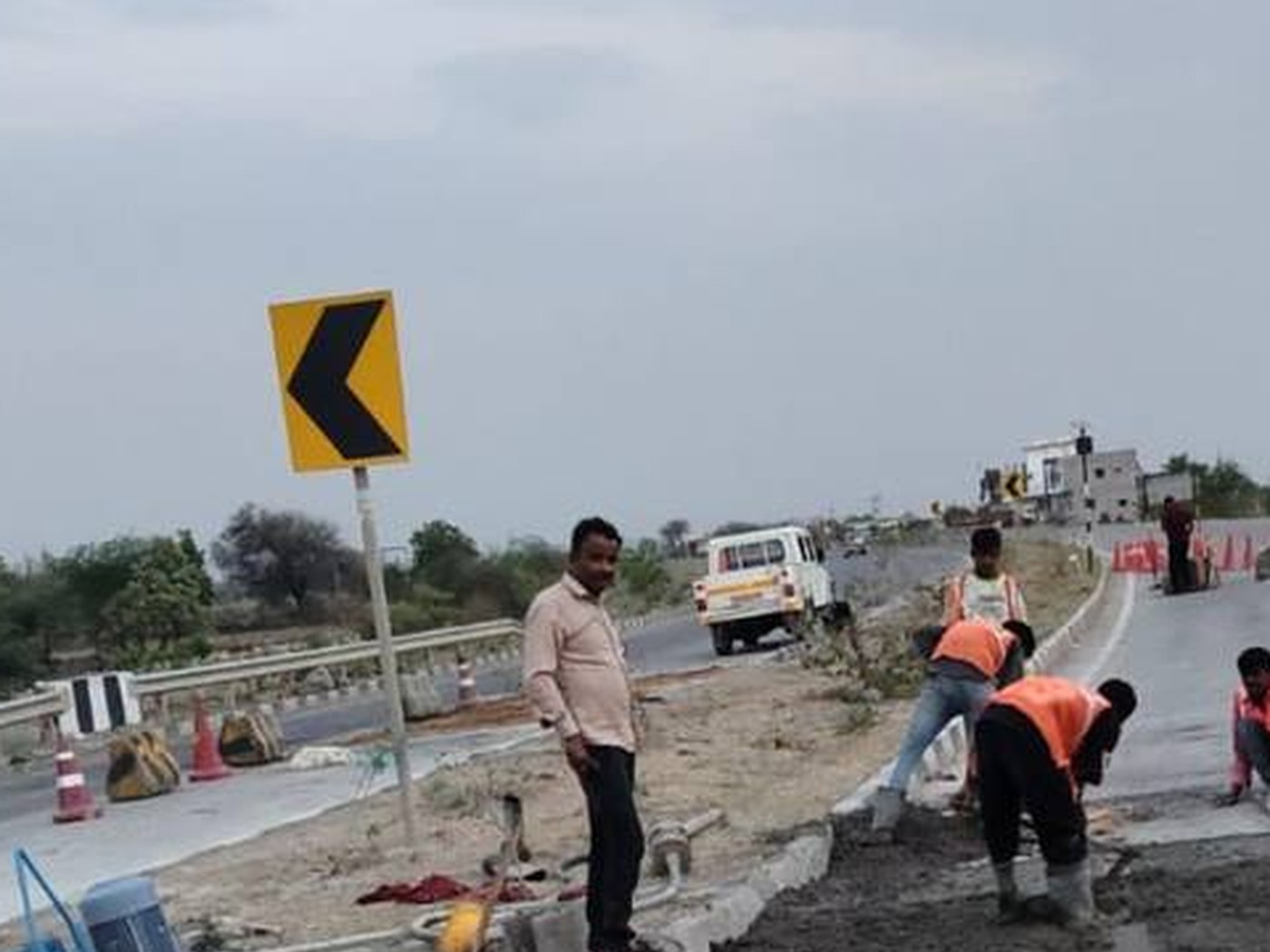 Site team completing concrete finishing on a highway