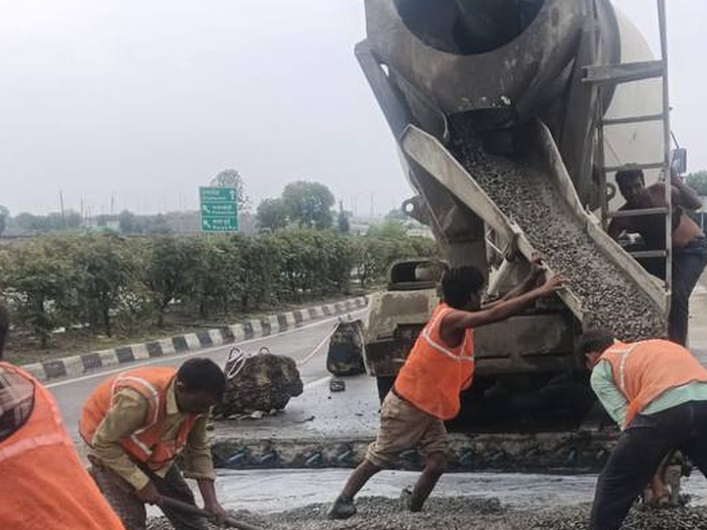 Site team placing concrete during civil works